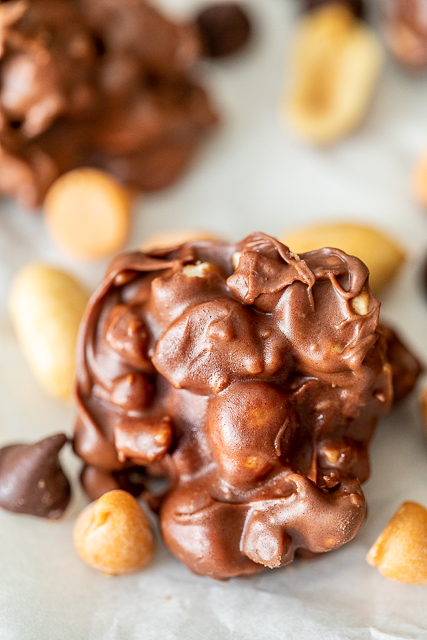 Chocolate Butterscotch Peanut Clusters - only 4 ingredients in this yummy no-bake treat! Chocolate chips, butterscotch chips, toffee bits and peanuts. We could not stop eating this yummy candy!!! Great for parties or a homemade holiday gift. I like to put them in a Christmas tin and give them to neighbors and co-workers. YUM! #candy #peanuts #chocolate #nobake Chocolate Butterscotch Peanut Clusters - only 4 ingredients in this yummy no-bake treat! Chocolate chips, butterscotch chips, toffee bits and peanuts. We could not stop eating this yummy candy!!! Great for parties or a homemade holiday gift. I like to put them in a Christmas tin and give them to neighbors and co-workers. YUM! #candy #peanuts #chocolate #nobake