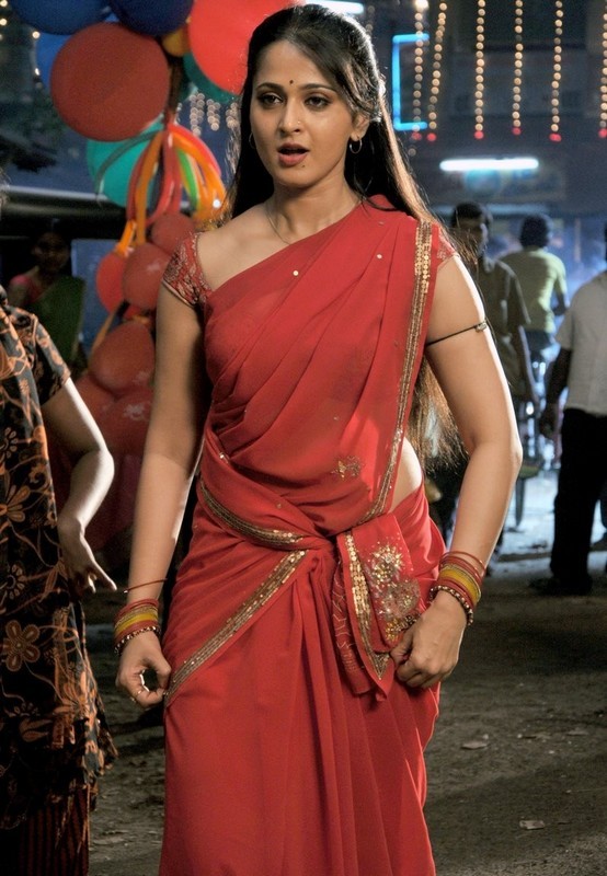 Tollywood Sargam Anushka Hot Hip Dancing Stills In Red Saree In Vaanam