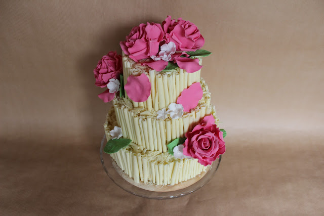 Wedding cake with white chocolate cigars