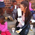  Photos: Miss South Africa accused of racism for wearing gloves while with black children at an orphanage