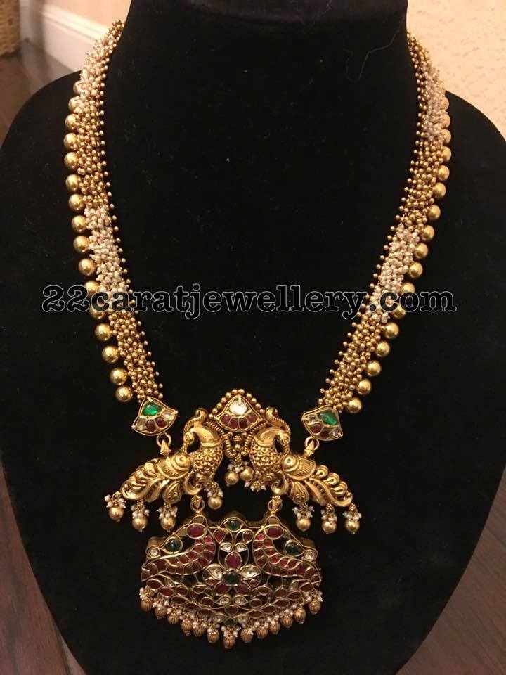 Gold Long Chain Two Step Peacock Pendant Jewellery Designs