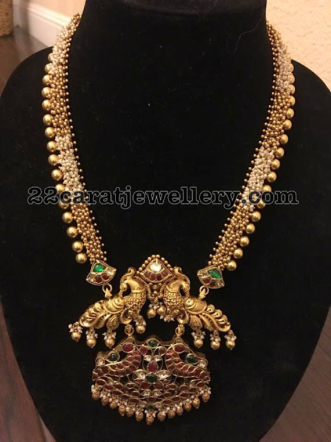 Gold Long Chain Two Step Peacock Pendant 