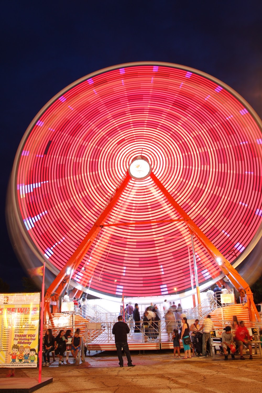 Ferris Wheel at Night Long Exposure Photograph