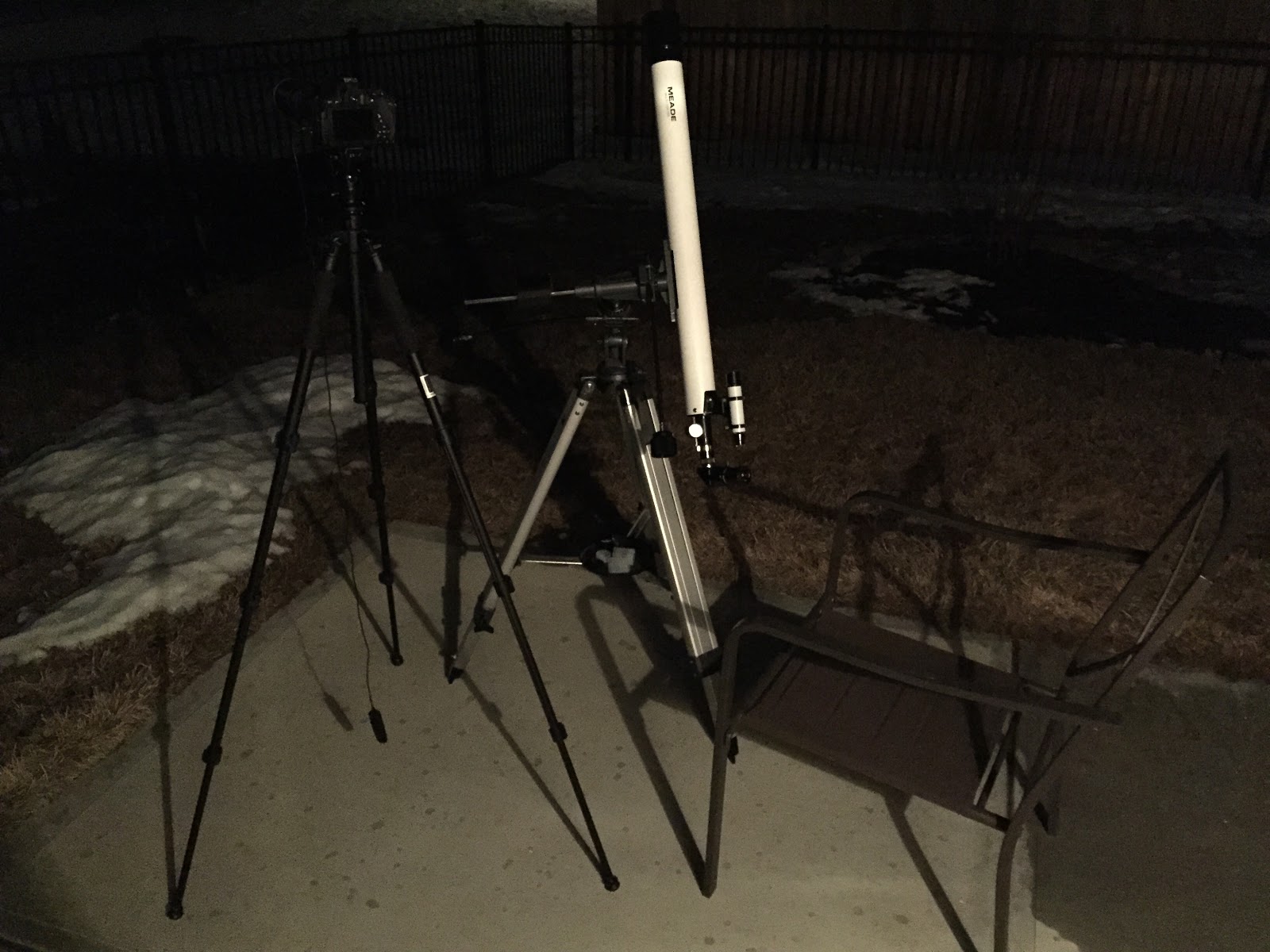 telescope and camera on porch