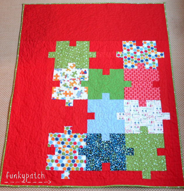 Colcha de patchwork con bloques de puzzle