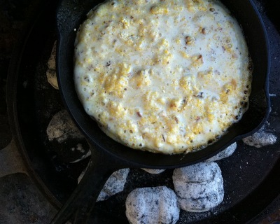 Simple Cast Iron Southern Cornbread ♥ KitchenParade.com, here 'Campfire Cornbread' cooked in a Dutch oven over an open fire.