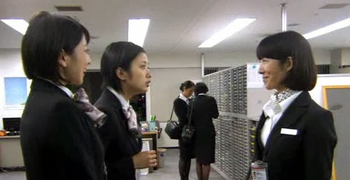 Misaki looks stunned as Nagano gives her instructions.