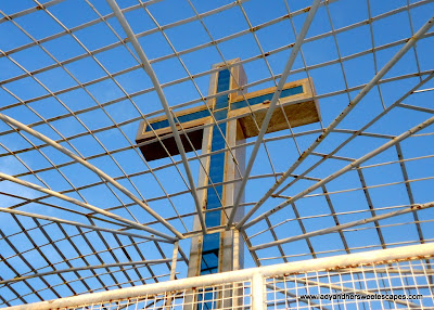 cross at the top of Pope John Paul II Tower