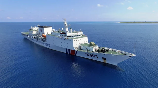 Image Attribute: 12,000 ton China Coast Guard (CCG) 3901 cutter No. 1123 patrols claimed islands in the disputed South China Sea.