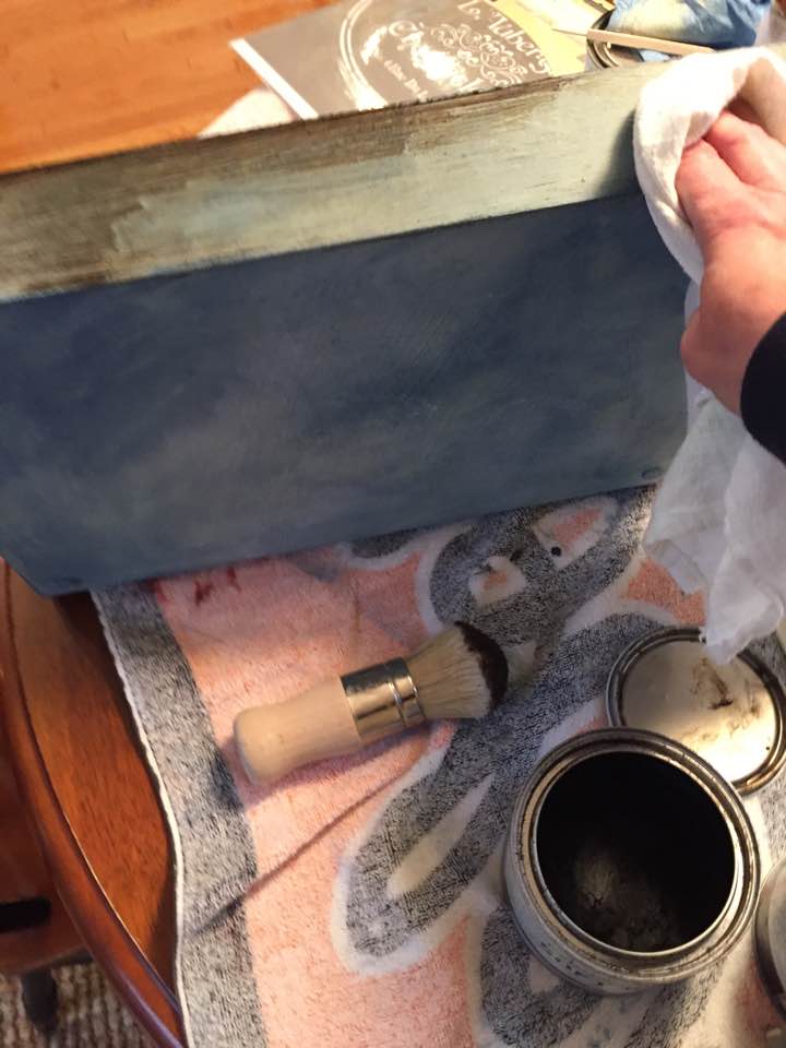 Applying dark wax to the side of the tray. Applying dark wax to the side of the tray.