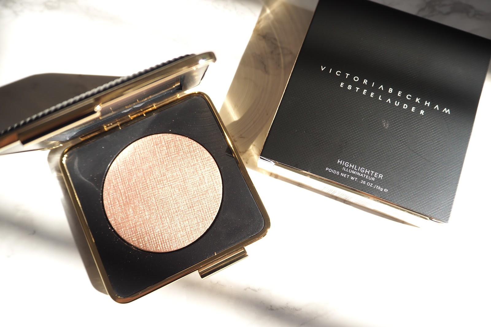 Victoria Beckham X Estée Lauder Makeup a little pop of coral.