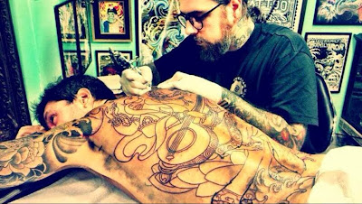 tattoo espalda marcelo tinelli 2013