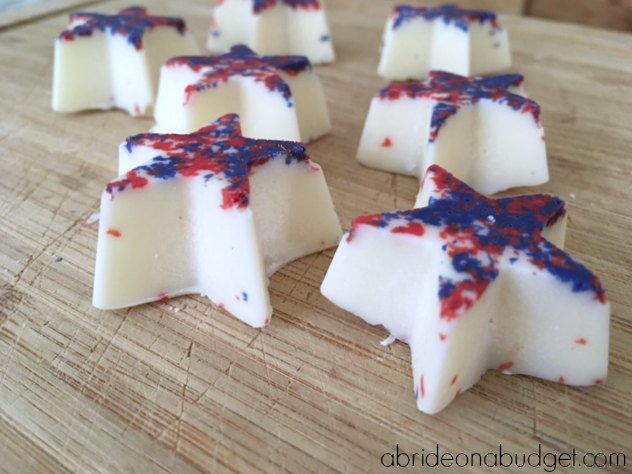 A perfect patriotic wedding favor are these Homemade Red, White, And Blue Chocolate Star Wedding Favors. Find out how to make them at www.abrideonabudget.com. You can change them to your wedding colors as well.