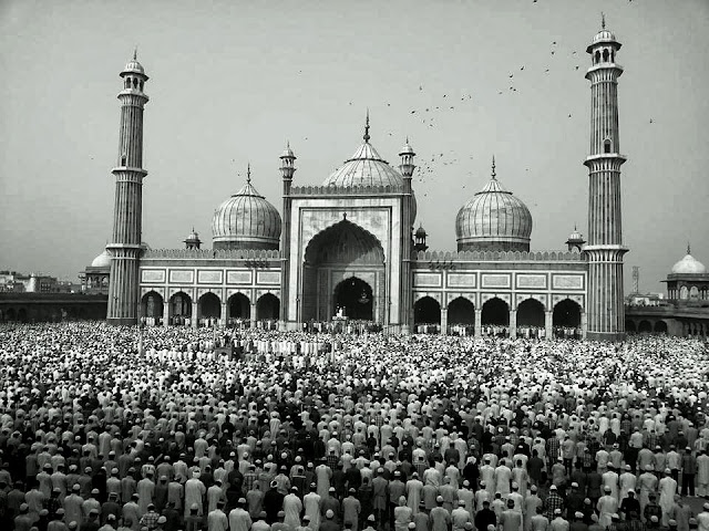 Aaditya visited Jama Majid and brought us some beautiful shots of the Eid Celebrations and prayers being offered. altWhile offering the prayers, people stand in queues, shoulder to shoulder, rich, poor, old, and young alike. This has been beautifully captured in thispicture.The pigeons fly above Jama Masjid as people offer prayers below. The picture speaks of peace and serenity.All devotees are equal before Allah, and on this auspicious day, all are in His presence - Blessed!Dear Allah, I leave my human ego behind and bow before you. You and only you are The Supreme Being. Devotees throng the premises of Jama Masjid. Those who can't get in, sit outside. There is no place in this world which is devoid of the presence of thLord, be it inside or outside the mosque. Any alms given in your name, My Lord, shall only go to those who need help. It is my promised that it will be used for good cause.