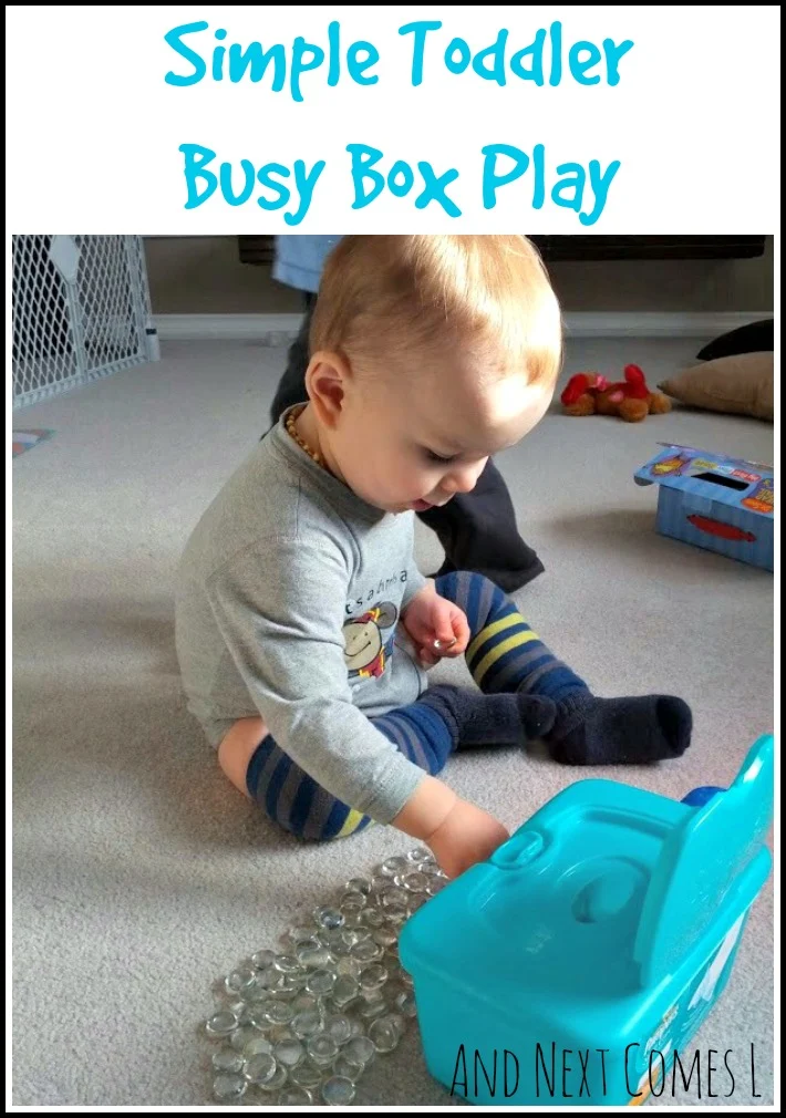 Simple busy box for toddlers that also recycles wipe containers from And Next Comes L