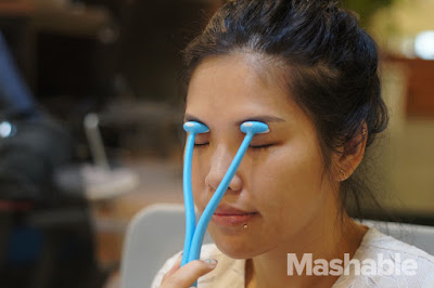 Alicia Tan trying out the Eye balancing massager Alicia Tan trying out the Eye balancing massager
