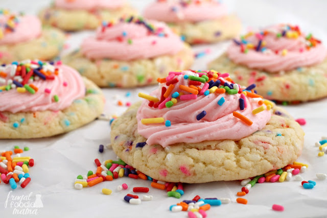 Soft & thick cake mix cookies are loaded up with rainbow sprinkles & then topped with a perfect buttercream frosting in these Rainbow Sprinkle-fetti Cookies.
