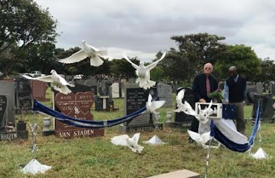 Doves being released for a funeral