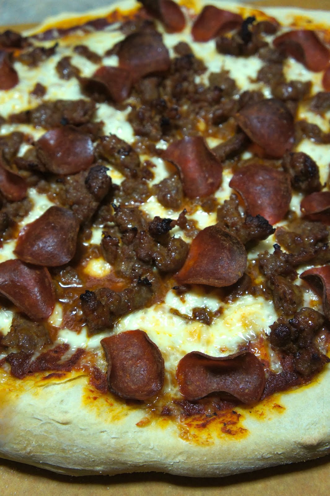 Savory Sweet and Satisfying Spicy Sausage and Pepperoni Pizza