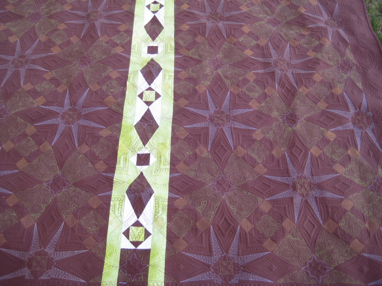 Threads on the floor: All finished but the binding