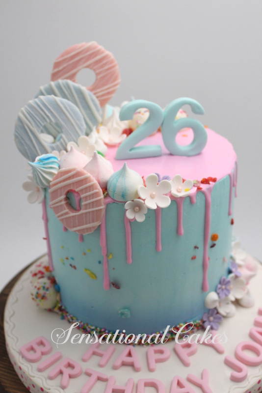 The Sensational Cakes Ombre pastel fun drip donut cake , drip cake singapore , shopkins donut