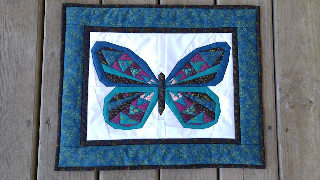 Paper pieced butterfly mini quilt