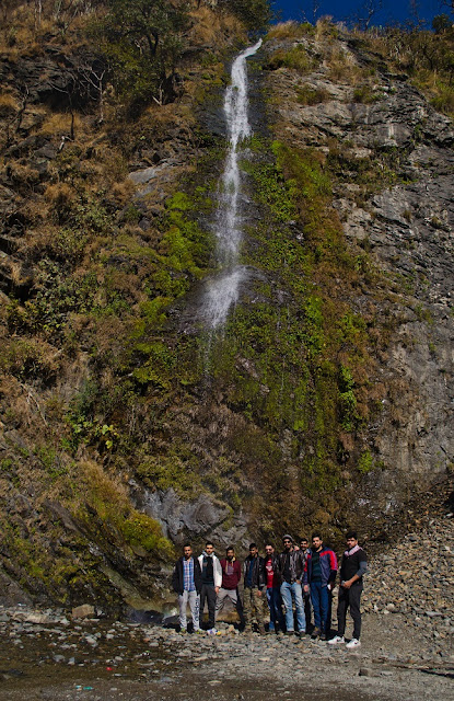 A roadside waterfall