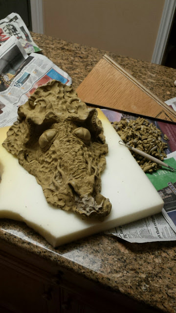 Pottery / stoneware dragon mask by Lily L, in progress.