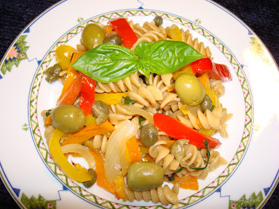 WHOLE WHEAT ROTINI WITH PEPPERS AND ONIONS PORTIONS: 4 INGREDIENTS 13.25 oz (375 g.) o 1 box whole grain pasta ½ tbsp. salt 2 tbsp. olive oil 3 garlic cloves cut in slices 1 small onion cut in Julienne ( cut onion in ½ and then length wise ) ½ yellow pepper cut in Julienne ½ red pepper cut in Julienne ½ orange pepper cut in Julienne 2 tbsp. fresh basil leaves cut in Julienne Salt  to taste 1/4 tsp. ground black pepper 2 tbsp. capers 15 olives PREPARATION 3/4 of a dip pan, fill it with water, ½ tbsp salt and let it boil Put in the pasta, cook it al dente and strain the water. In a hot frying pan saute garlic and onions for 2 minutes. Add peppers and lightly cook. Add the basil leaves, pepper, capers, olives, pasta and salt to taste. Serve immediately.