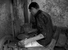 monochrome potter wheel kumbharwada dharavi mumbai india