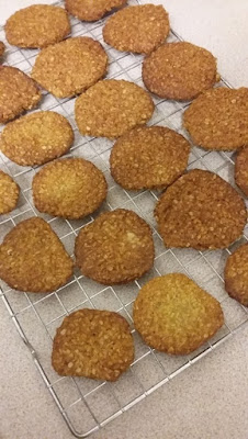 Picture of home-made New Zealand Anzac Biscuits cooling on a wire rack