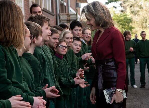 Queen Mathilde of Belgium visited a Horticultural School (Tuinbouwschool) in Melle. brown leather skirt silk blouse