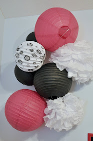 party decorations, pink and black, paper lanterns, paper pom poms