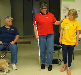 Laurel teaches sighted guide to day campers