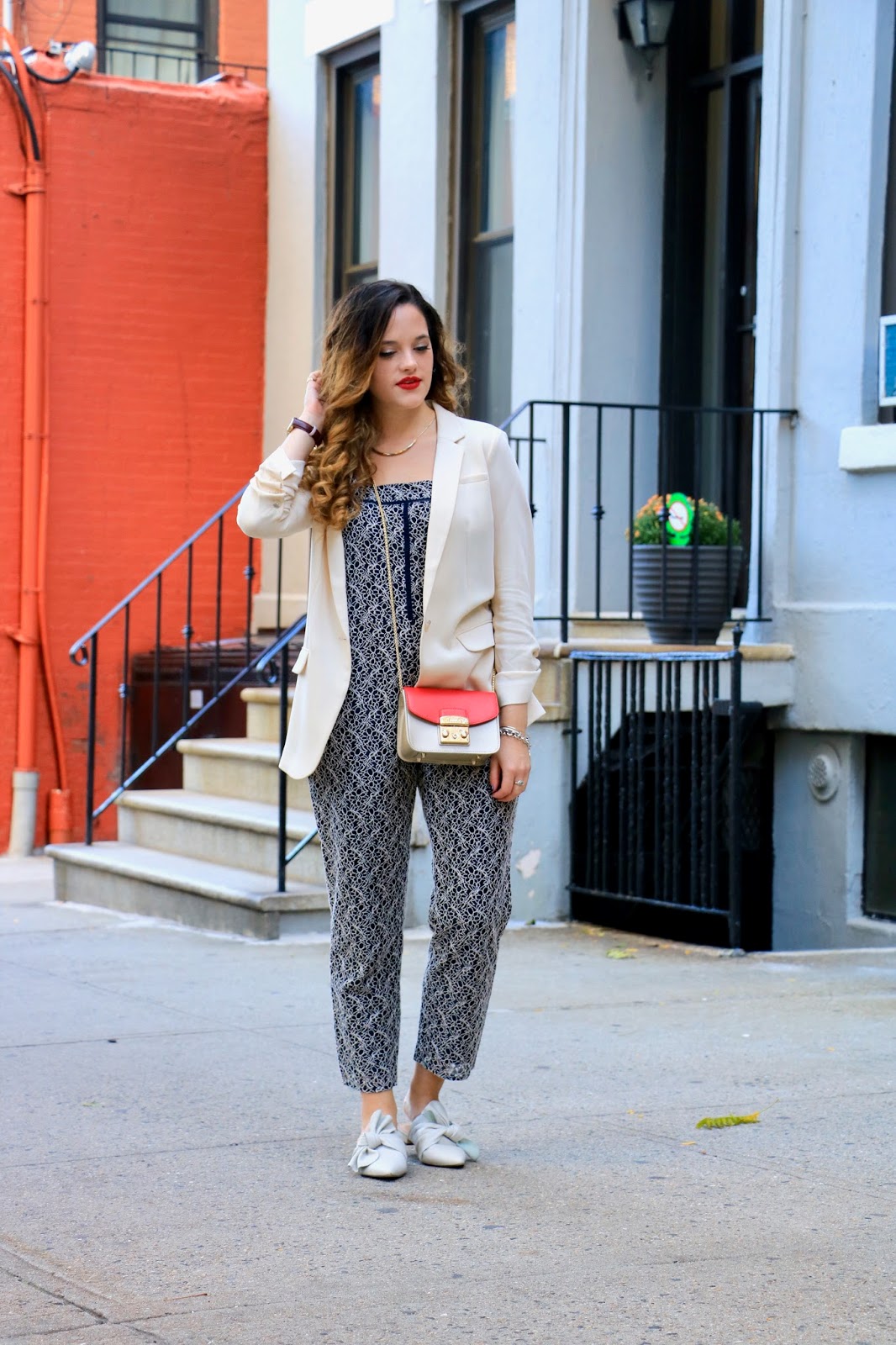 NYC fashion blogger Kathleen Harper showing how to wear a jumpsuit