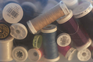 box of colourful threads