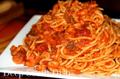 Shrimp Spaghetti, often referred to as shrimp boat spaghetti, because it could easily be made with a scoop out of the day's catch and ingredients easy transported on a shrimp boat. A nice shortcut, tomato based sauce made with shrimp, bell pepper and garlic and tossed with spaghetti noodles.