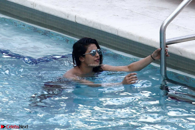 Hot Pics Of Priyanka Chopra In Bikini Priyanka Chopra in Swimming costume bikini in a Swimming Pool at a