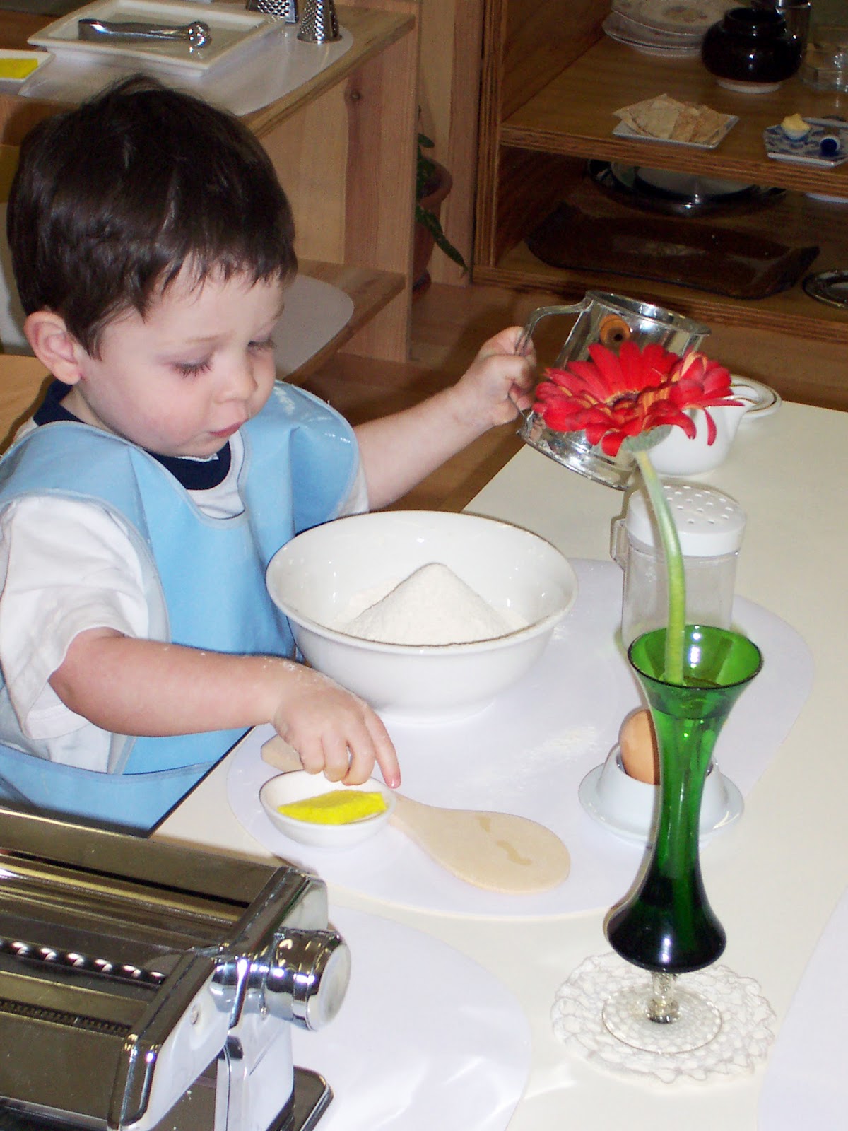 Montessori Moms: Pouring water? Spooning Rice?