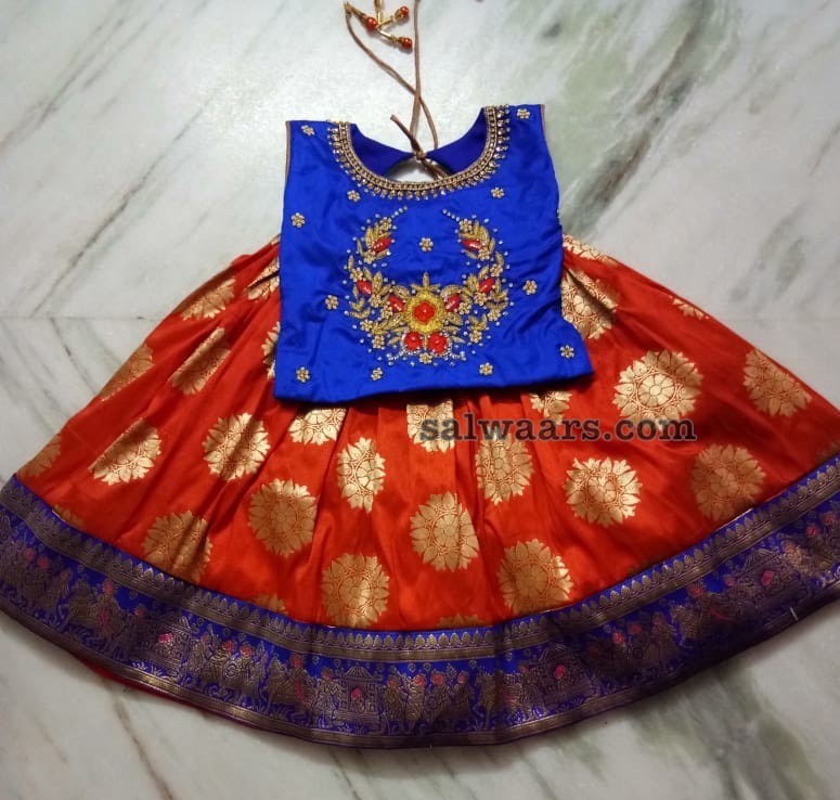 orange lehenga with blue blouse
