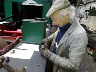 Peter checking fusible plugs against drawings