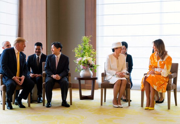 Melania Trump wore Dries van Noten floral print cotton coat. Naruhito and Empress Masako at Tokyo hotel