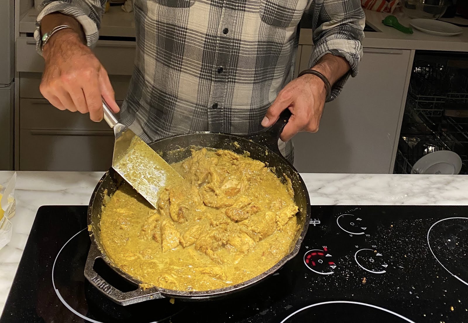 Mom's legendary chicken curry underway.