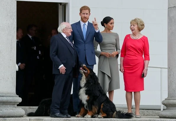 Meghan Markle wore Roland Mouret bespoke Barwick grey dress and Birks Snowflake snowstorm diamond earrings, she carried Fendi Peekaboo bag