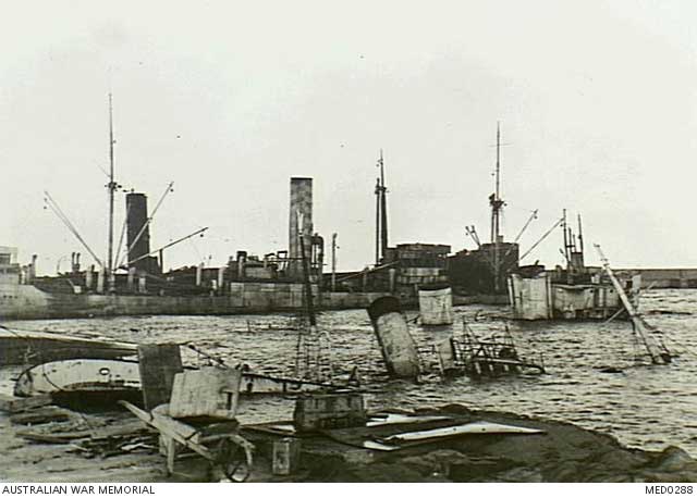 Wrecks in Benghazi Harbor, 14 January 1942 worldwartwo.filminspector.com