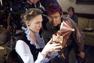 Photo of Vera Farmiga and James Wan on the set of The Conjuring