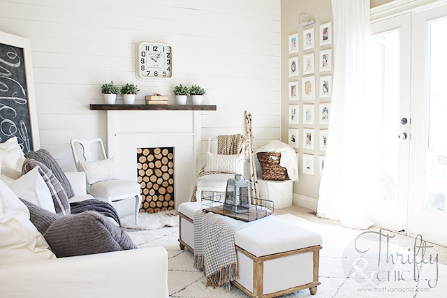 White farmhouse decorating ideas for the living room with DIY shiplap and faux fireplace