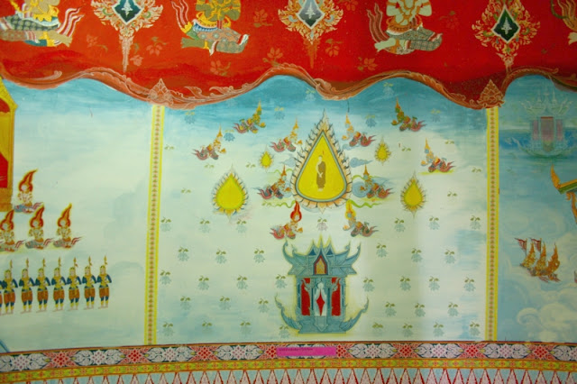 Buddhist temple Wat Kao Poon is explained  in an illustrated hand painted story on the walls.