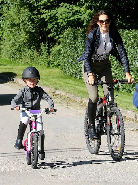 Crown Princess Mary wore Cavalleria Toscana shirt, Down Jacket, Trousers and Prada Sunglasses. Princess Josephine, Prince Vincent, Prince Christian on Summer Holiday