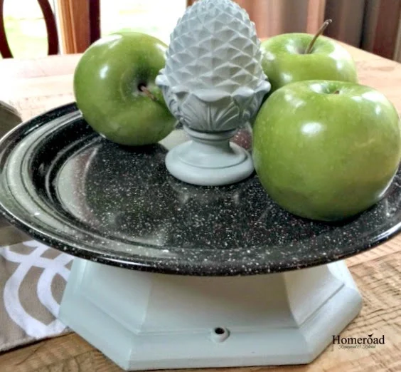 A Pedestal Dish with green apples